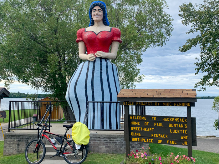 Lucette Statue A bicycle leans against the statue of Lucette in Hackensack MN