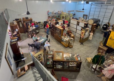 Patrons wander through the exhibits in a one-room museum