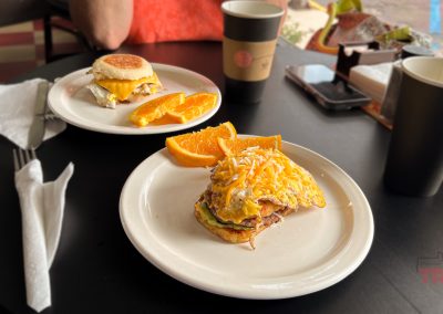 A closeup of two plates of breakfast food
