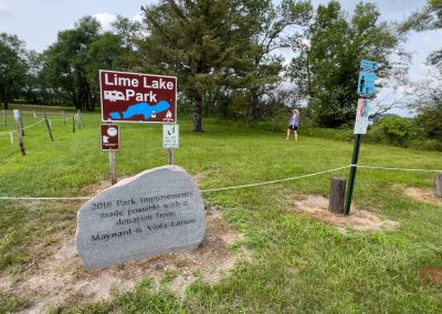 The entrance sign to Lime Lake Park at the parking lot