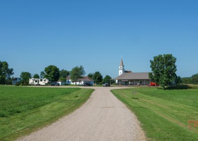Landscape view of the grounds of an open air museum with historic buildings