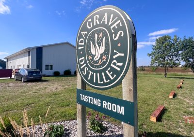 The sign outside of Ida Graves Distillery