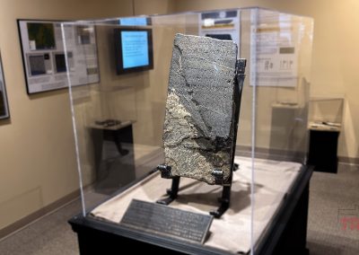 The Kensington Rune Stone on display in a glass case